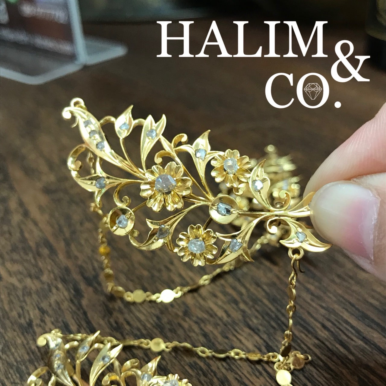 A gorgeous set of three antique gold brooches set with polki diamonds with patterned chains.