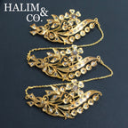 A gorgeous set of three antique gold flower brooches set with polki diamonds with patterned chains. Kebaya Jewelry / Peranakan Nyonya Jewelry