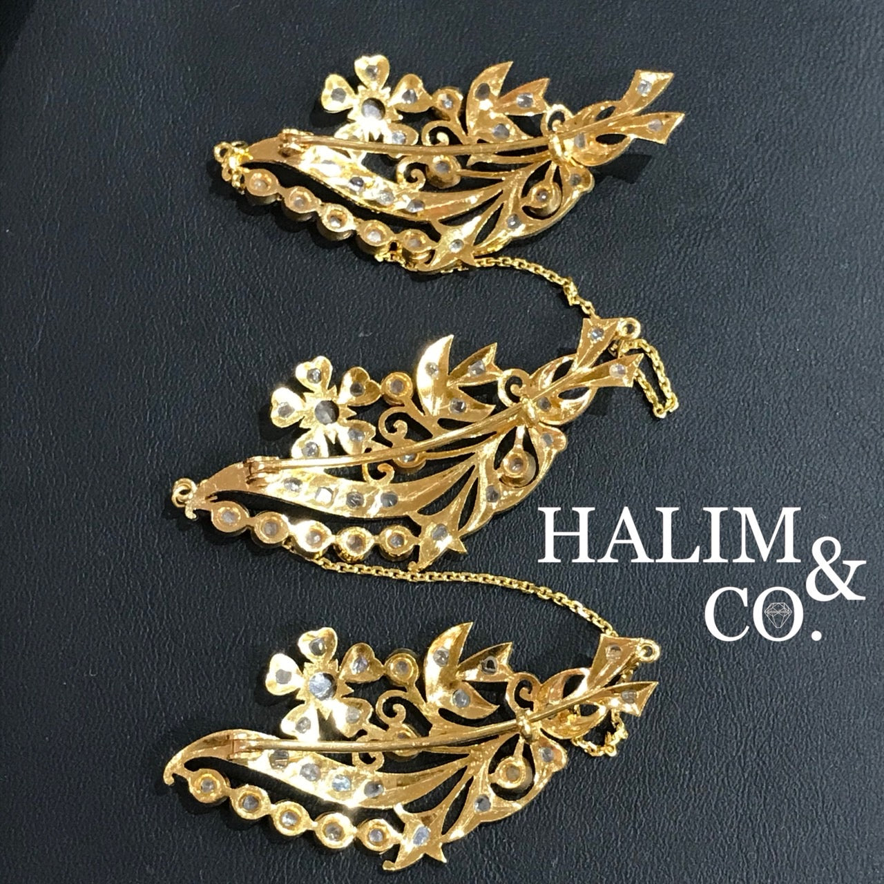 A gorgeous set of three antique gold flower brooches set with polki diamonds with patterned chains. Kebaya Jewelry / Peranakan Nyonya Jewelry