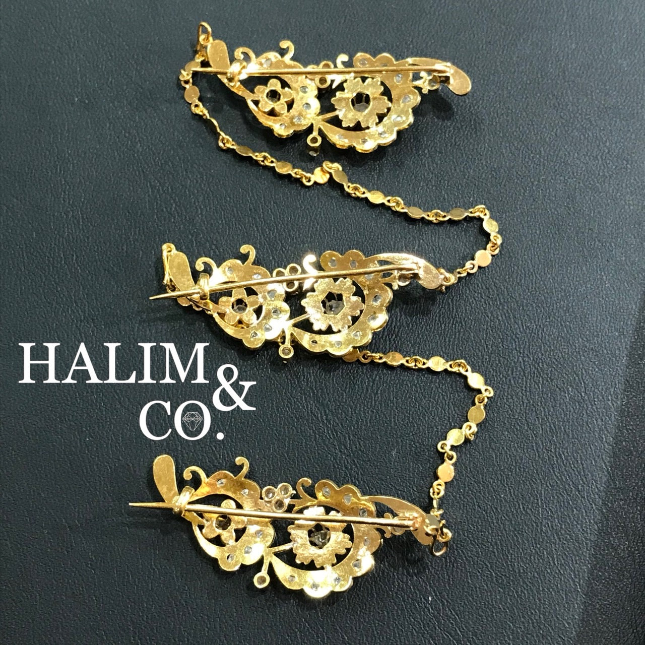 A gorgeous set of three antique gold brooches set with polki diamonds with patterned chains. Kebaya Jewelry / Peranakan Nyonya Jewelry