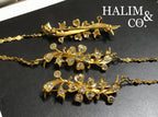 A gorgeous set of three antique gold brooches set with Old Cut Diamonds with patterned chains. Kebaya Jewelry / Peranakan Nyonya Jewelry
