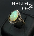 Antique Natural Opal And Old Cut Diamond Cluster Ring.
