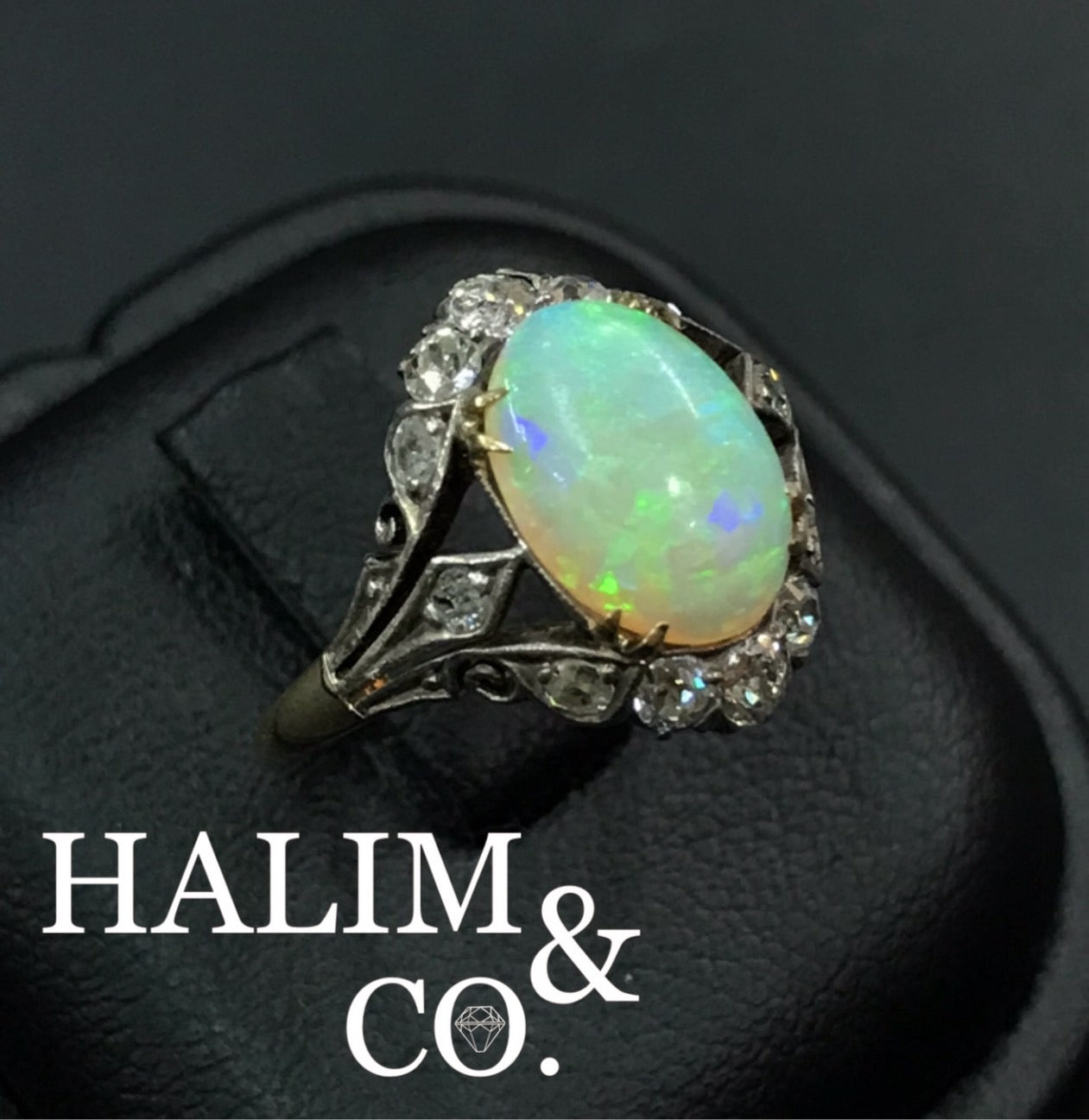 Antique Natural Opal And Old Cut Diamond Cluster Ring.