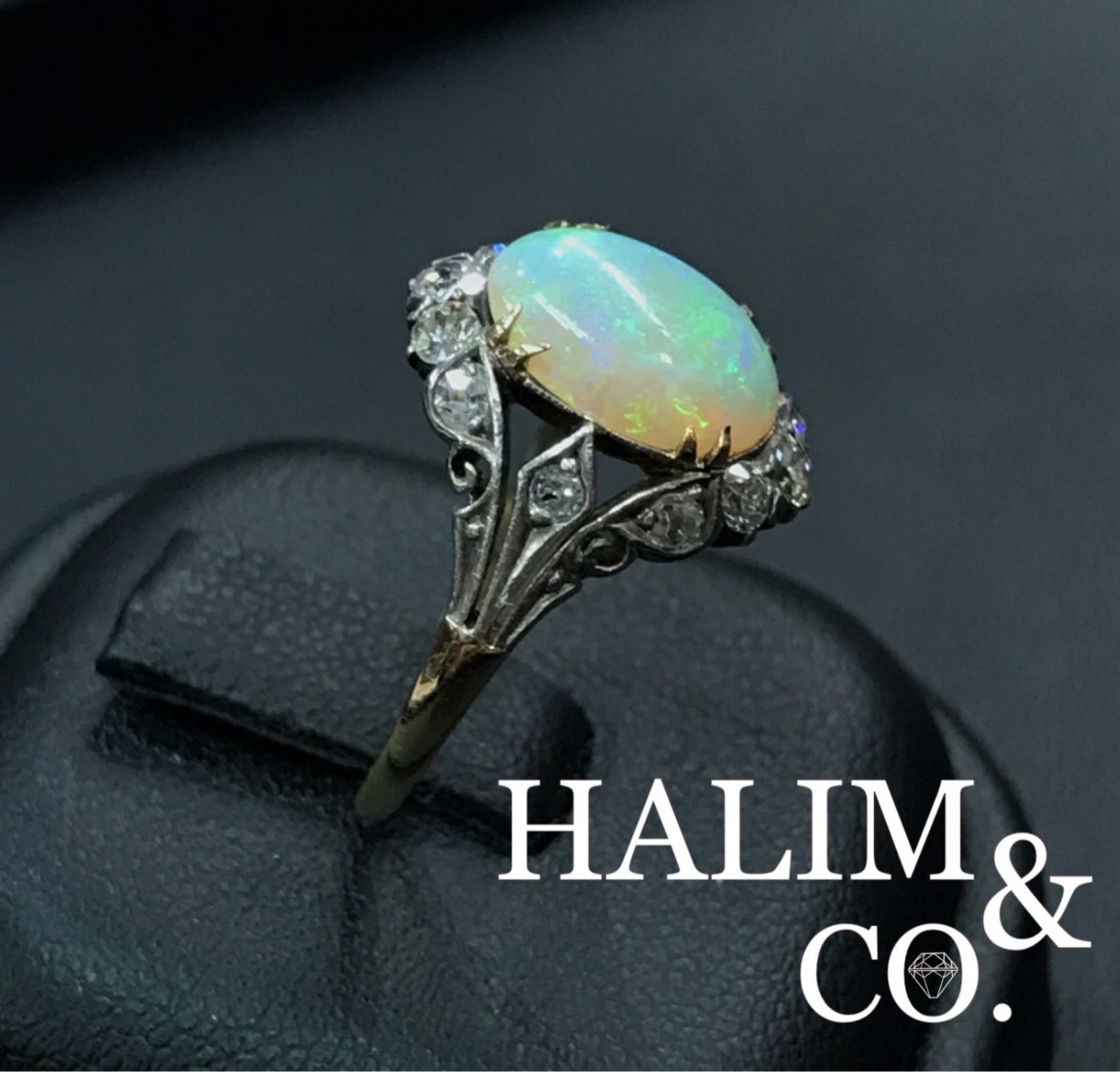 Antique Natural Opal And Old Cut Diamond Cluster Ring.