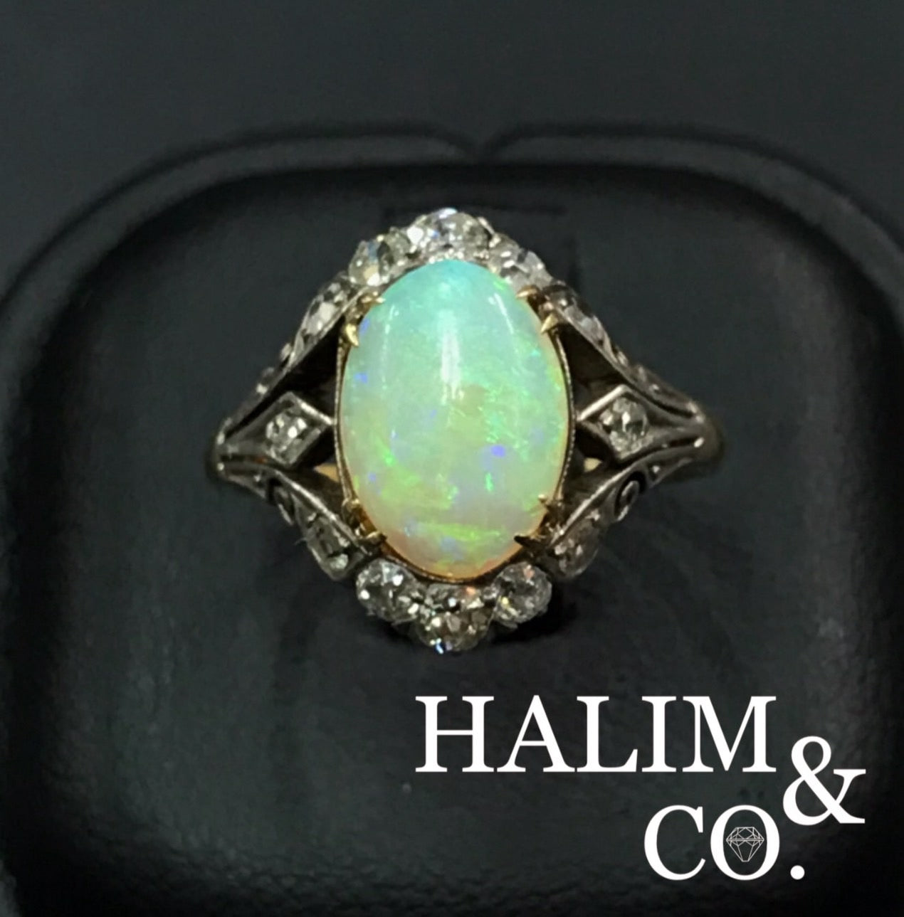 Antique Natural Opal And Old Cut Diamond Cluster Ring.