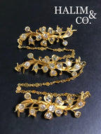 A gorgeous set of three antique gold brooches set with Old Cut Diamonds with patterned chains. Kebaya Jewelry / Peranakan Nyonya Jewelry