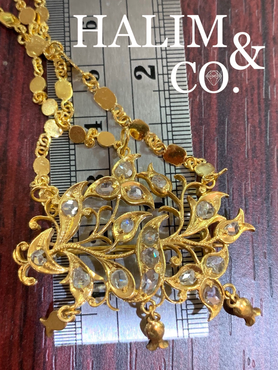 A gorgeous set of three antique gold brooches set with Rose cut Diamond with triple patterned chains.