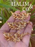 A gorgeous set of three antique gold brooches set with polki diamonds with patterned chains. Kebaya Jewelry / Peranakan Nyonya Jewelry