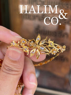 A gorgeous set of three antique gold brooches set with polki diamonds with patterned chains. Kebaya Jewelry / Peranakan Nyonya Jewelry