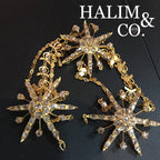 A gorgeous set of three antique gold brooches n Pendant set with polki diamonds with triple patterned chains.