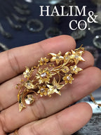 A gorgeous set of three antique gold brooches set with polki diamonds with patterned chains. Kebaya Jewelry / Peranakan Nyonya Jewelry