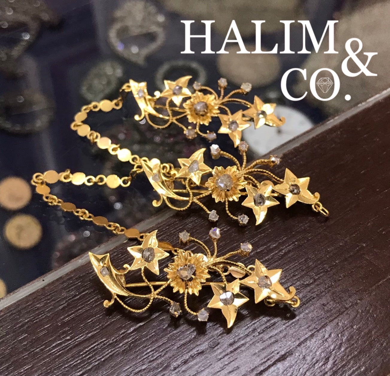 A gorgeous set of three antique gold brooches set with polki diamonds with patterned chains.