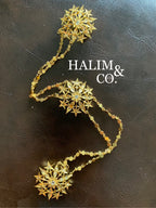 A gorgeous set of three antique polki diamond brooches set with detachable chains.