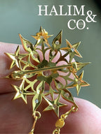 A gorgeous set of three antique polki diamond brooches set with detachable chains.