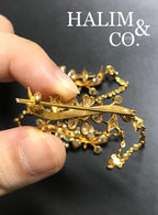A gorgeous set of three antique gold brooches set with Old Cut Diamonds with patterned chains. Kebaya Jewelry / Peranakan Nyonya Jewelry
