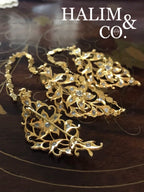 A gorgeous set of three antique gold brooches set with polki diamonds with patterned chains. Kebaya Jewelry / Peranakan Nyonya Jewelry
