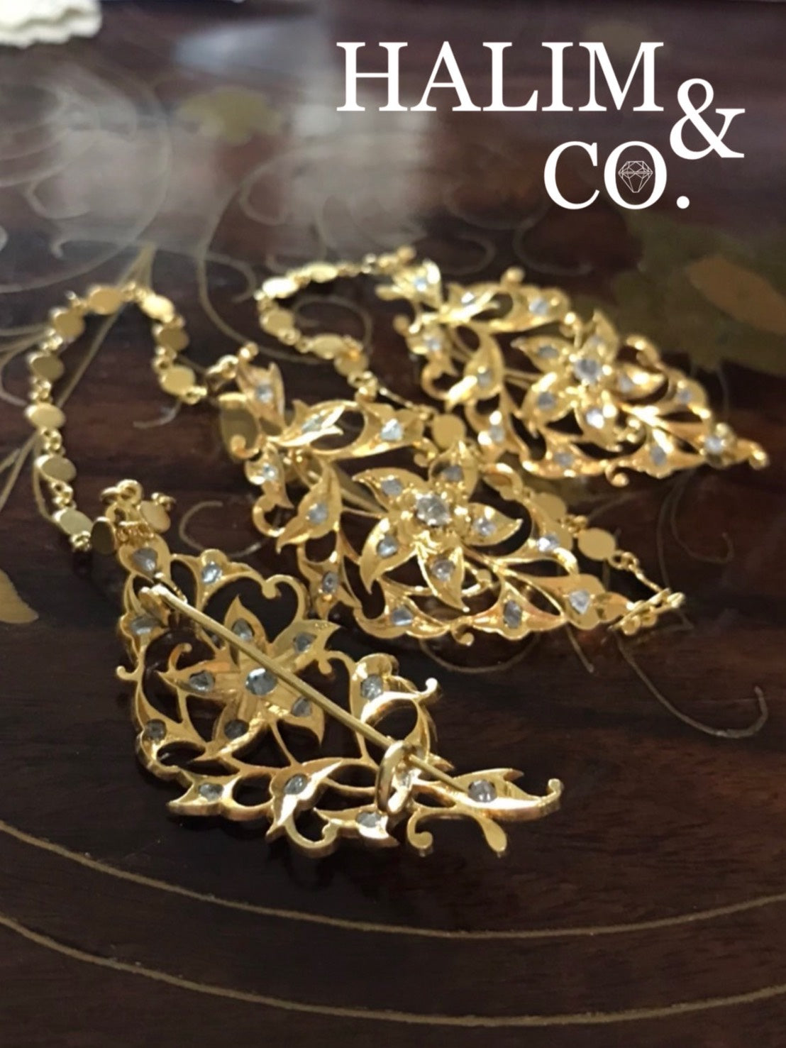 A gorgeous set of three antique gold brooches set with polki diamonds with patterned chains. Kebaya Jewelry / Peranakan Nyonya Jewelry